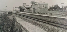 Load image into Gallery viewer, Historic view of Rhoystellen (Rhostyllen) Station on the GWR Rhos Branch near Wrexham—brick goods shed, waiting room and single-track platform dating from the 1901 opening of the station (closed to passengers in 1931).