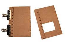 Load image into Gallery viewer, Rail Model Rhoystellen Station Goods Shed, 4 mm scale—two laser-cut MDF wall sections being assembled, one with a square window opening and the other clamped for gluing, showing finger-jointed construction.