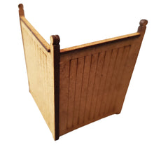Load image into Gallery viewer, A wooden station privacy screen with posts and a top edge, designed for model train setups.