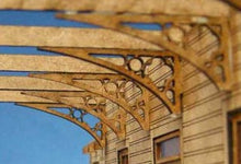Load image into Gallery viewer, A set of canopy brackets made from MDF, designed for model railway setups, showing intricate detailing.