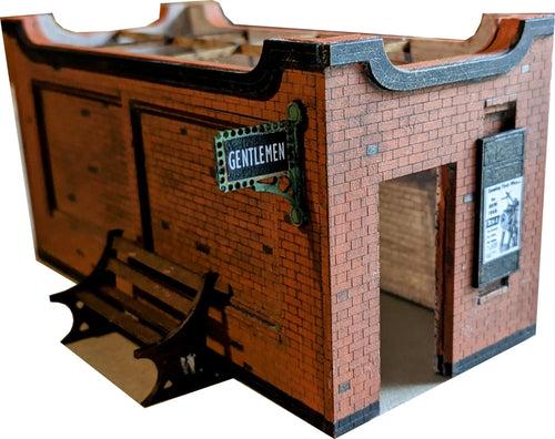 A model of a Gents Station Platform Toilet made from MDF with brick detailing, a sign board, and a laser board interior wall.