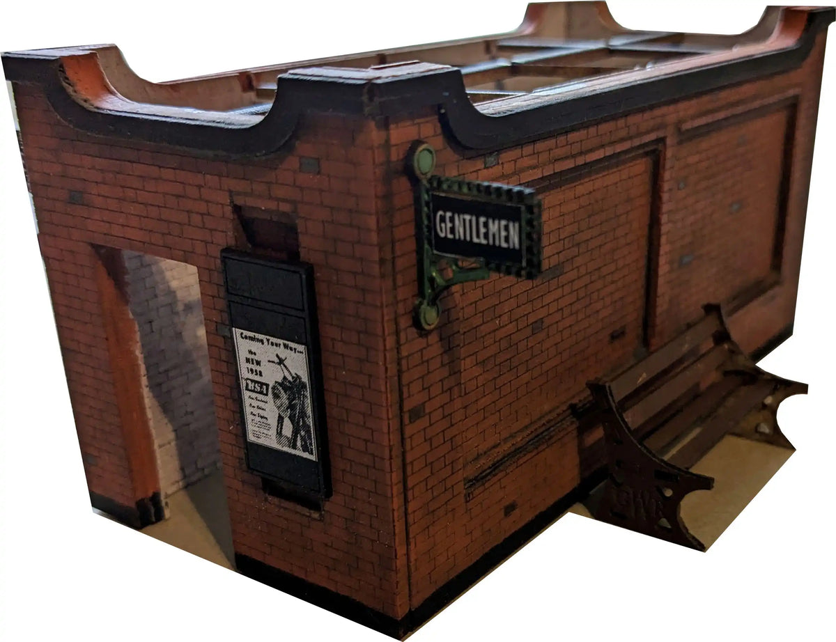 A model of a Gents Station Platform Toilet made from MDF with brick detailing, a sign board, and a laser board interior wall.