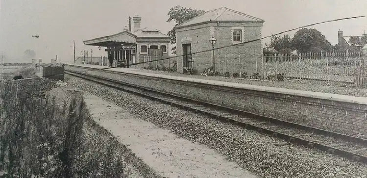 Historic view of Rhoystellen (Rhostyllen) Station on the GWR Rhos Branch near Wrexham—brick goods shed, waiting room and single-track platform dating from the 1901 opening of the station (closed to passengers in 1931).