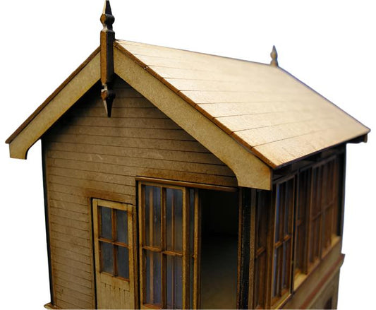 A wooden model of a LNWR signal box with detailed laser-cut patterns, featuring a roof, windows, and a spire.