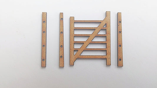 A laser cut 1mm MDF gate and posts for model railway scenery.
