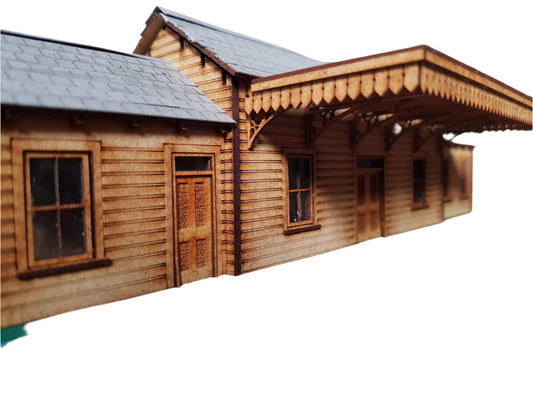 A 4mm scale model of Chudleigh Country Station, featuring wooden construction with a detailed canopy, windows.