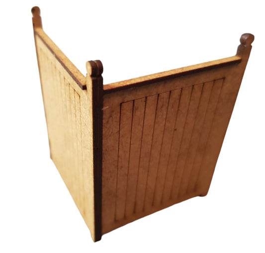 A wooden station privacy screen with posts and a top edge, designed for model train setups.