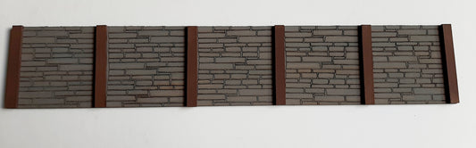 A model of a dockside walling made from laser cut and engraved 2mm MDF, featuring a series of interlocking sections.