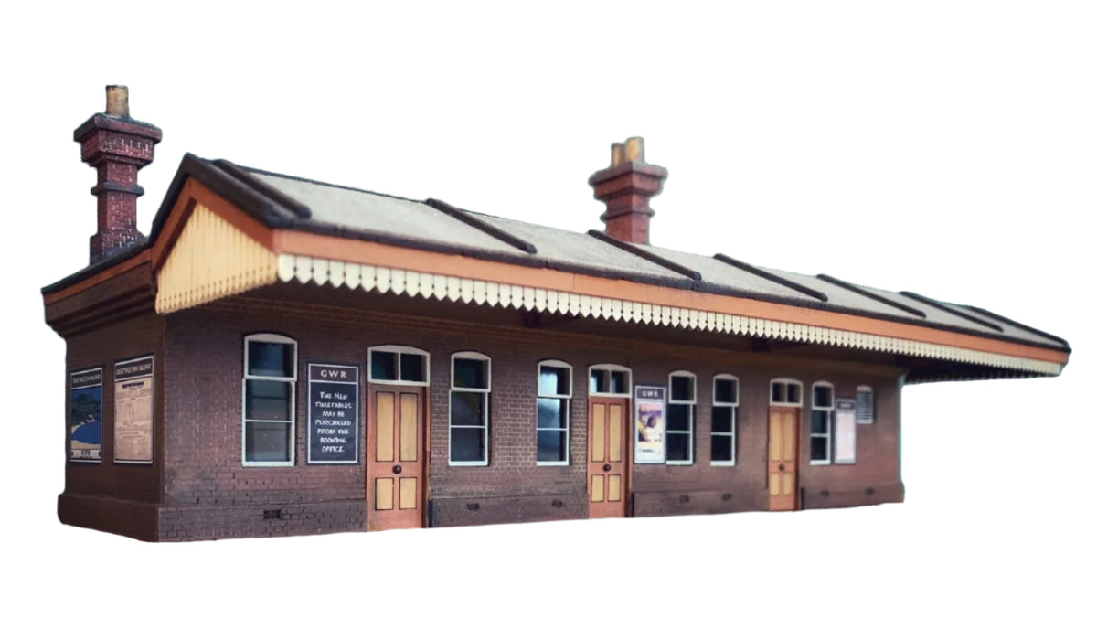 A 4mm scale model of Rhostyllen Railway Station with detailed brickwork, windows, and a canopy.