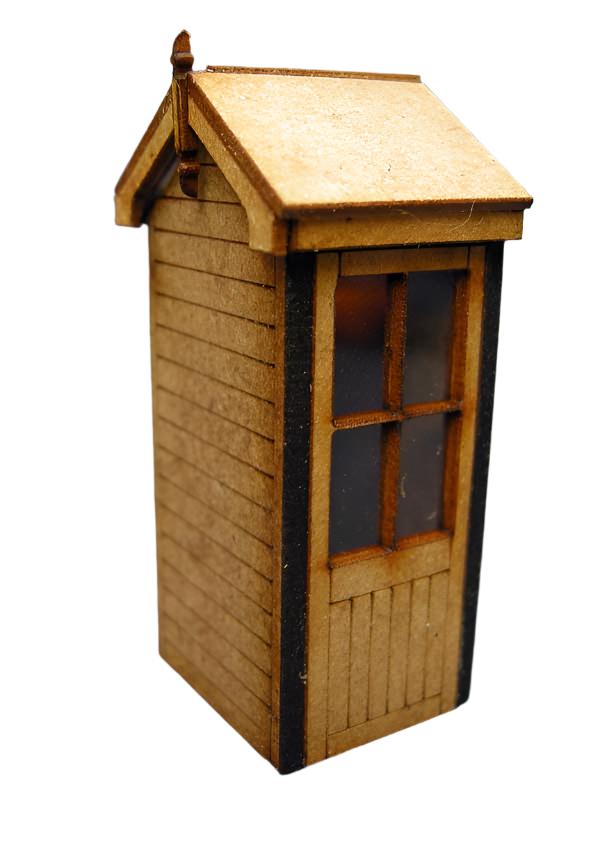 A model of a Leamington South Junction Signal Box, made with laser cut and etched wooden components, featuring a brick wall, steps, gutter, downpipe, and window film detail.