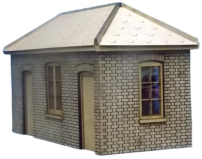 A laser cut and engraved model kit representing a small station cycle shed or store, featuring a roof, gutter, downpipe, and diamond tiles.