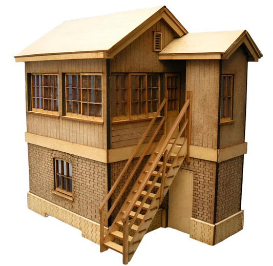 A 4mm scale model of the Helston Signal Box, featuring a detailed wooden structure with steps, windows, and a thatched roof.
